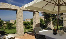 Villa Domus 17 | Terrace with view on the parklike garden Sardinia