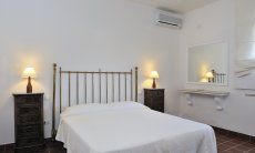 Villa Aquila Giardino | First bedroom with double bed Sardinia