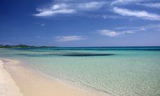 Crystal clear water on the beach of Costa Rei