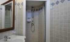 Villa Zoello 10 | Ensuite bathroom with shower Ensuite bathroom with shower