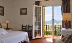 Bedroom 1 with double sized bed and sea view 