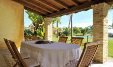 Villa Il Palmeto | Dining table on the shady terrace Dining table on the shady terrace
