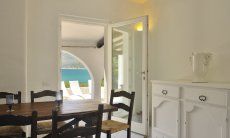 Villa Maria Mercedes | Dining place with terrace access Living