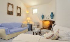 Villa Maria Mercedes | Sofa corner at the fireplace Lounge
