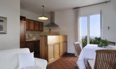 Villa Aquila Alta | Kitchen integrated into the living room Sardinia