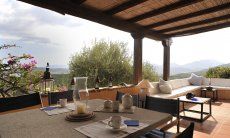 Apartment Country Club 1 | Terrace with stone table and lounge area Terrace with stone table and lounge area