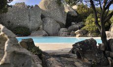 Pool surrounded by rock formations 