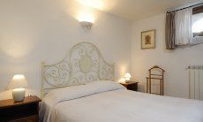 Villa Cala Ginepro | Bedroom 2 (downstairs) with double sized bed Bedroom 2 (downstairs) with double sized bed