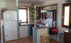 Villa Cala Ginepro | Open kitchen Sardinian, rustic kitchen
