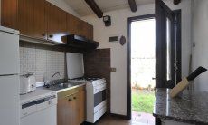Su Faru 4 | Kitchen with all essential devices and garden access Kitchen with all essential devices and garden access
