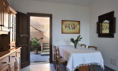 Apartment Castededdu 7 | Living room with dining table and kitchen Dining Area