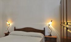 Apartment Castededdu 9 | Bedroom 2 with double sized bed and storage space Bedroom 2 with double sized bed and storage space