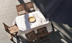 Apartment Cala Liberotto I | Dining table on the terrace from above Dining table on the terrace from above