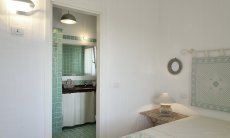 Li Conchi 25 | Bedroom 1 with ensuit bath View to the Bathroom and Bedroom
