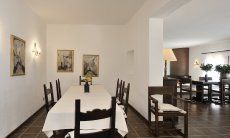 Villa Nautilus | Dining room with a long table Dining room with a long table