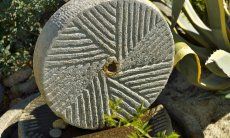 Casa Grecino | Old milestone in the garden Old milestone in the garden