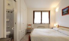Villa Zoello 10 | Bedroom 1 with a double bed and ensuite bathroom Bedroom 1 with a double bed and ensuite bathroom