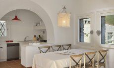 Li Conchi 11 | Dining with kitchen in the background Sardinia
