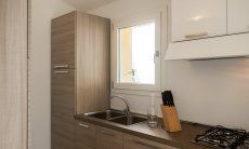 Villa Caterina | Kitchen with big fridge, oven, stove and dishwasher Kitchen
