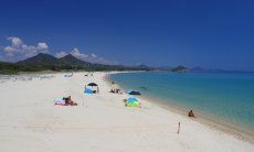 Wide, white sandy beach of Cala Sinzias in Sardinia