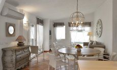 Li Conchi 33 | Living room with sofa and dining area Living-dining area