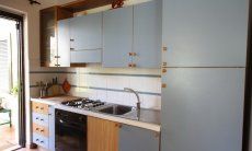 Villa La Viola | Kitchen with all essential devices and garden access Kitchen with all essential devices and garden access