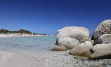 Sant Elmo beach with crystal clear water and granite rocks