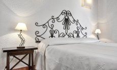 Villetta Quattro | Bedroom with a double sized bed and sea view Bedroom with a double sized bed and sea view