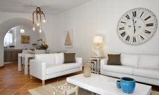 Li Conchi 39 | Living room with sofa corner, dining table and kitchen Relax