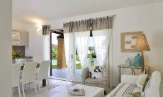 Villa Campidano 21 | Modern and bright living room Living room with door to the pool Villa Campidano 21
