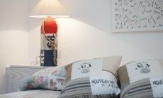 Villa Campidano 21 | Bedroom with mediterranean furniture accessories Bed with cushions, night table and lamp Villa Campidano 21