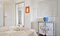 Villa Campidano 7 | Bedroom 1 with a view to the corridor Bedroom