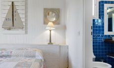Li Conchi 6 | Bedroom 1 with a view into the bathroom Bedroom
