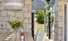 Li Conchi 14 | Terrace with entrance and dining table Terrace