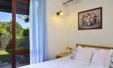 Villa Maria Lina | Bedroom 2 with double sized bed and terrace access Bedroom 2 with double sized bed and terrace access
