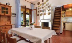Villa Maria Lina | Livingroom with stairs to the attic livingroom with stairs to the attic