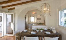 Li Conchi 9 | Dining table and view into the kitchen Dining table and view into the kiitchen Li Conchi 9, Cala Sinzias