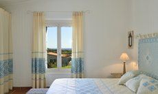 Li Conchi 10 | Main Bedroom - View Main Bedroom with gardenview Li Conchi 10, Cala Sinzias