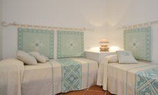 Bedroom with two single beds Li Conchi 10, Cala Sinzias