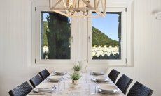 Dining Table on the window with view Li Conchi 10, Cala Sinzias