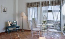 Li Conchi 26 | Living Room with Table Living Room with Table