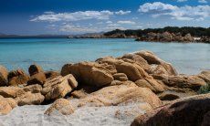 Cala Caprioccioli with rocks in crazy shapes and crystal clear water