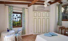 Villa Domus 9d | Bedroom 1 with a small table Bedroom 1 with a small table