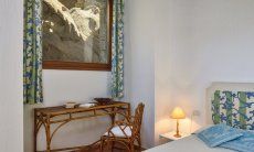 Villa Domus 9d | Bedroom 1 with rock formation behind the window Bedroom 1 with rock formation behind the window