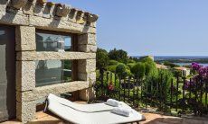 Terrace with sunbeds and seaview of Villa Domus 16