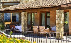 Villa Torretta Chia | View of the dining-and lounge area on the panorama terrace View of the dining-and lounge area