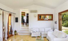 Villa Torretta Chia | Living area with big panorama windows Living area with big windows