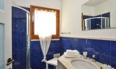 Villa Torretta Chia | Ensuite bath of bedroom 1 with shoer Bathroom 3 with shower