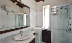 Villa Ibiscus | Bathroom 1 with shower and washing maschine Bathroom 1 with shower and washing maschine