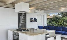 Bright kitchen with a view towards the palm trees 